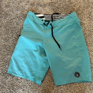 Gently used board shorts swim trunks